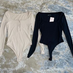 NWT long sleeve bodysuits